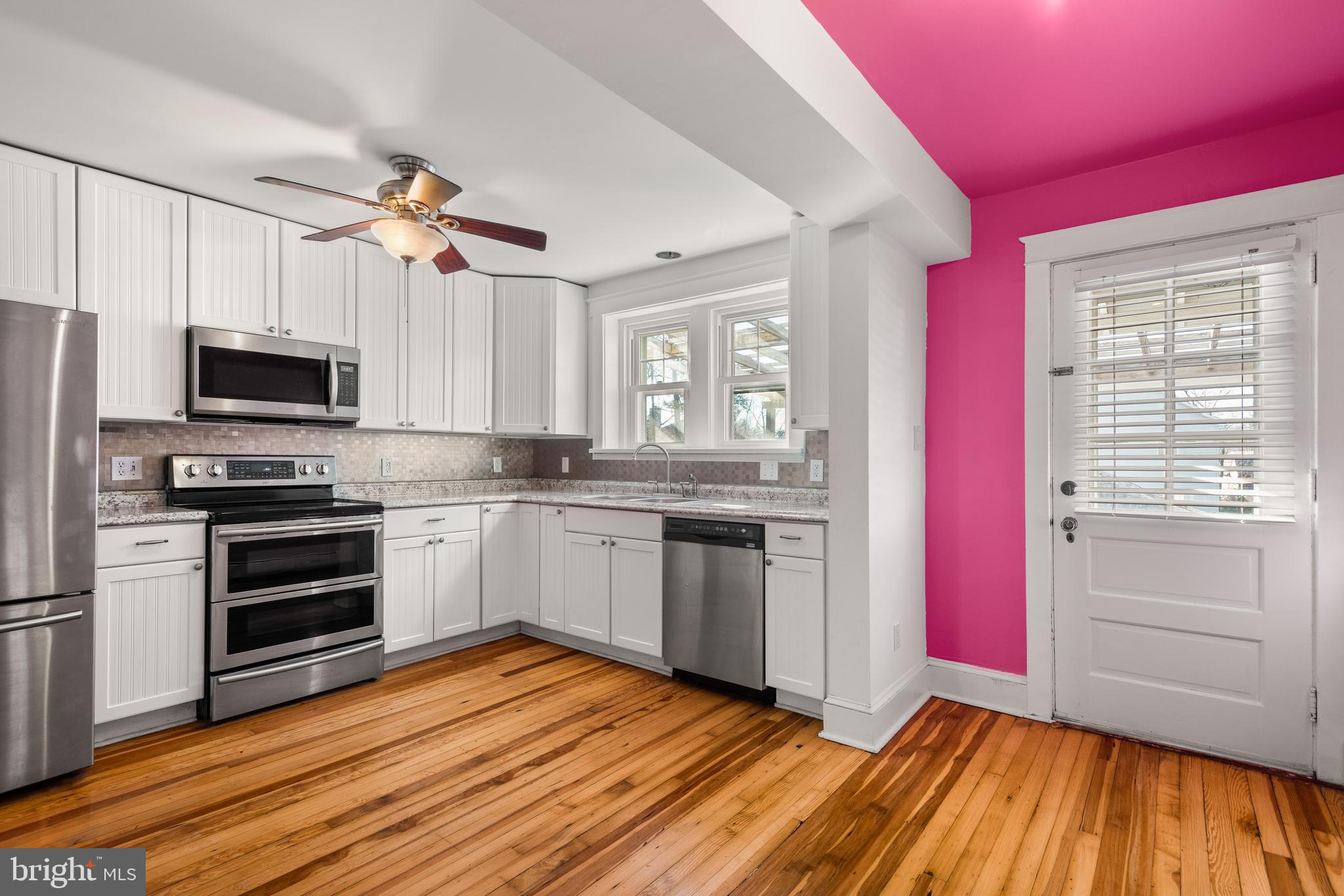 112 Conestoga Road Wayne, PA 19087 - Photo 14 of 32 a kitchen with granite countertop a sink stainless steel appliances and cabinets