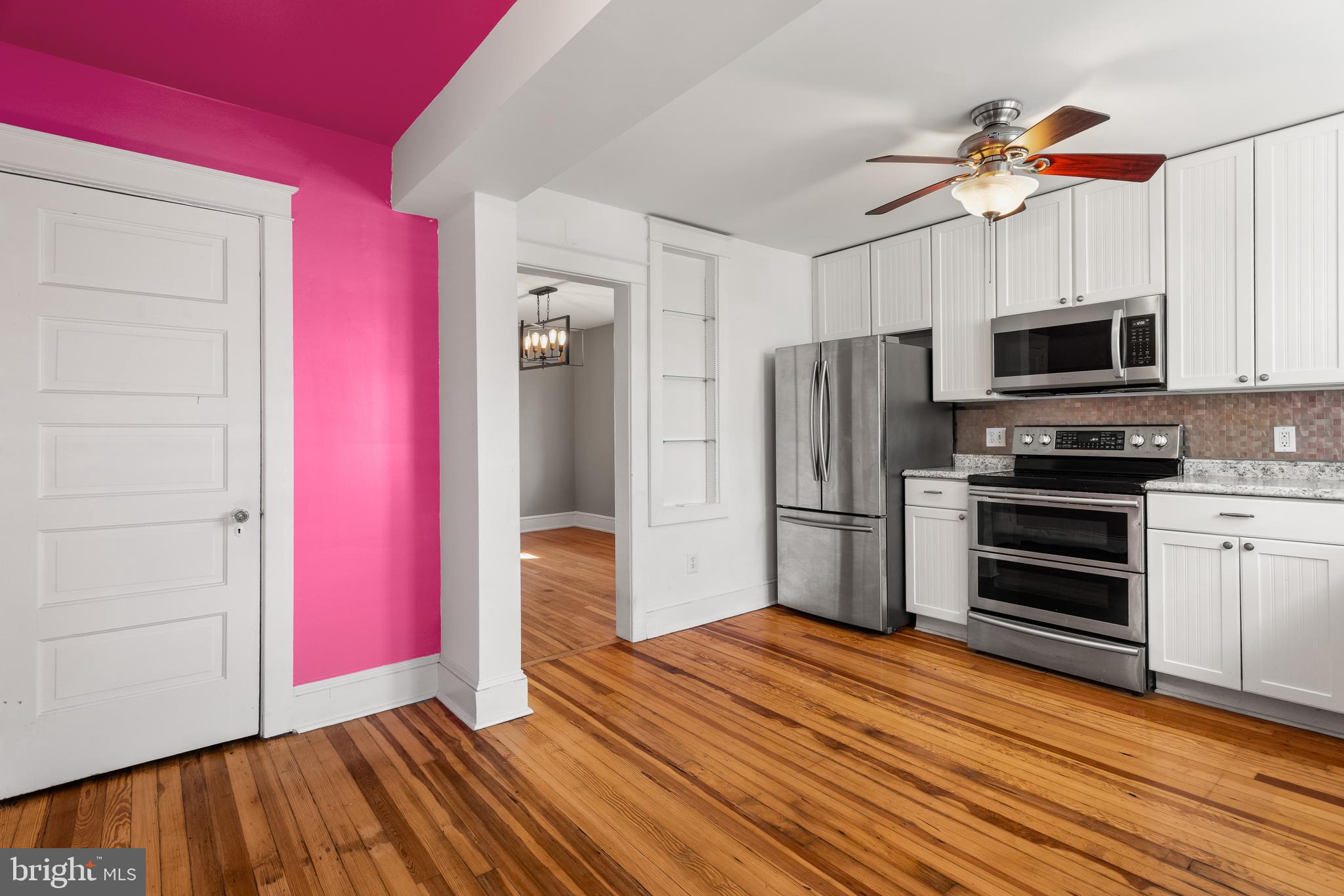 112 Conestoga Road Wayne, PA 19087 - Photo 15 of 32 a kitchen with stainless steel appliances a stove microwave and refrigerator