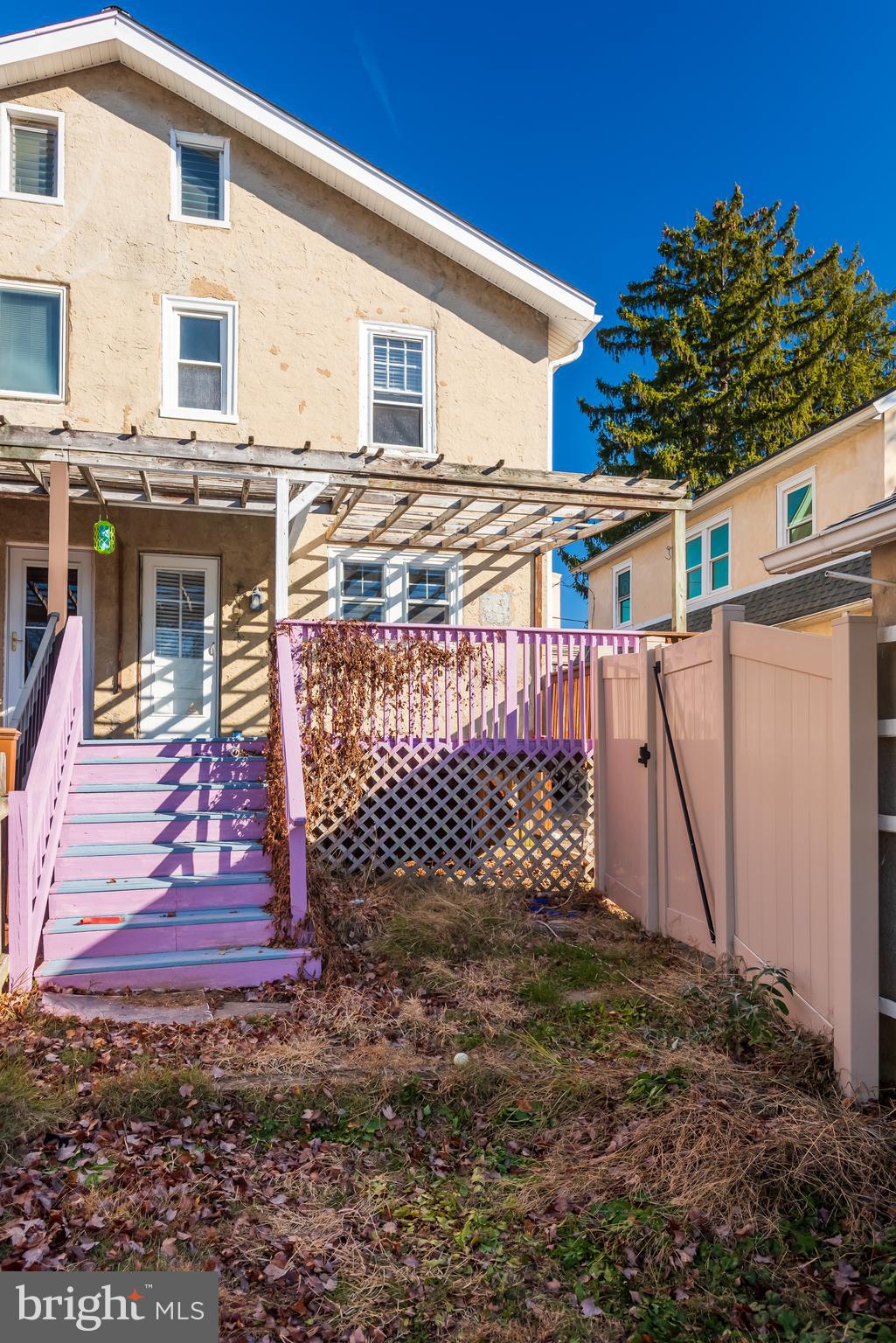 112 Conestoga Road Wayne, PA 19087 - Photo 32 of 32 a view of a house with a small yard and wooden fence