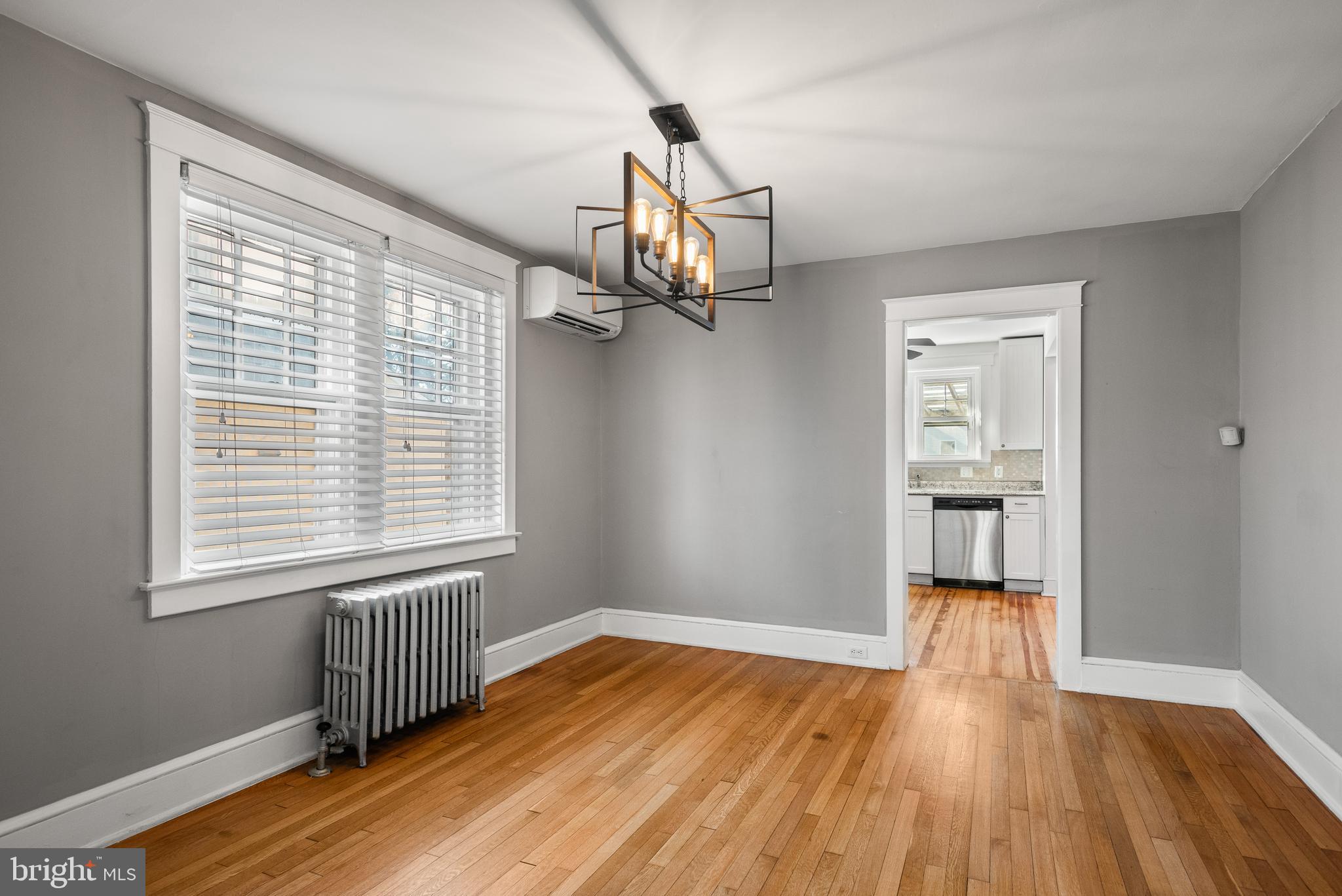112 Conestoga Road Wayne, PA 19087 - Photo 9 of 32 a view of empty room with wooden floor and fan