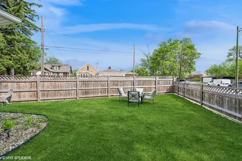 a view of outdoor space with deck and outdoor seating