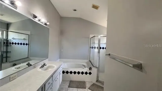 a view of a kitchen from the hallway