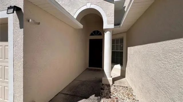 a view of a hallway with entryway
