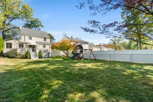 a view of a big yard with a house