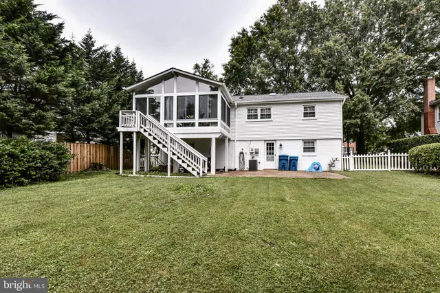 a house that has a big yard in front of it