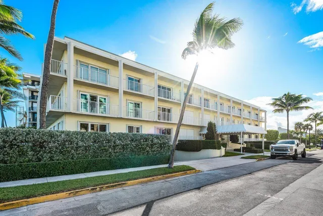a view of swimming pool with outdoor seating and yard in back