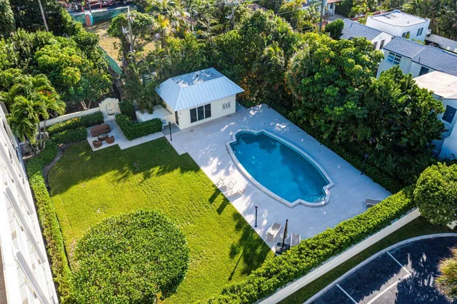 a view of a backyard of a house