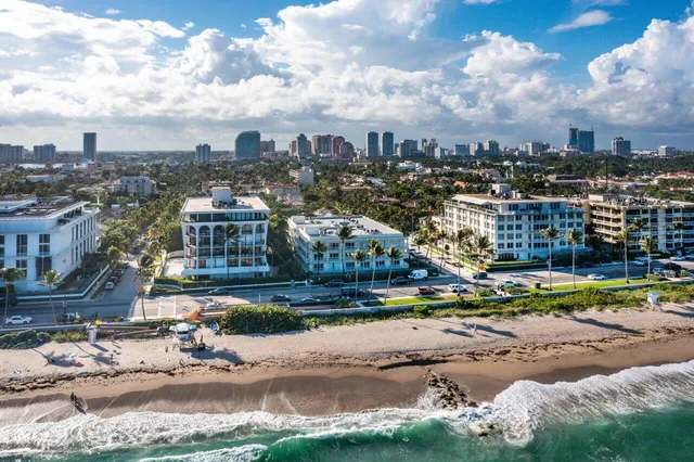 a view of a water fountain and a big yard