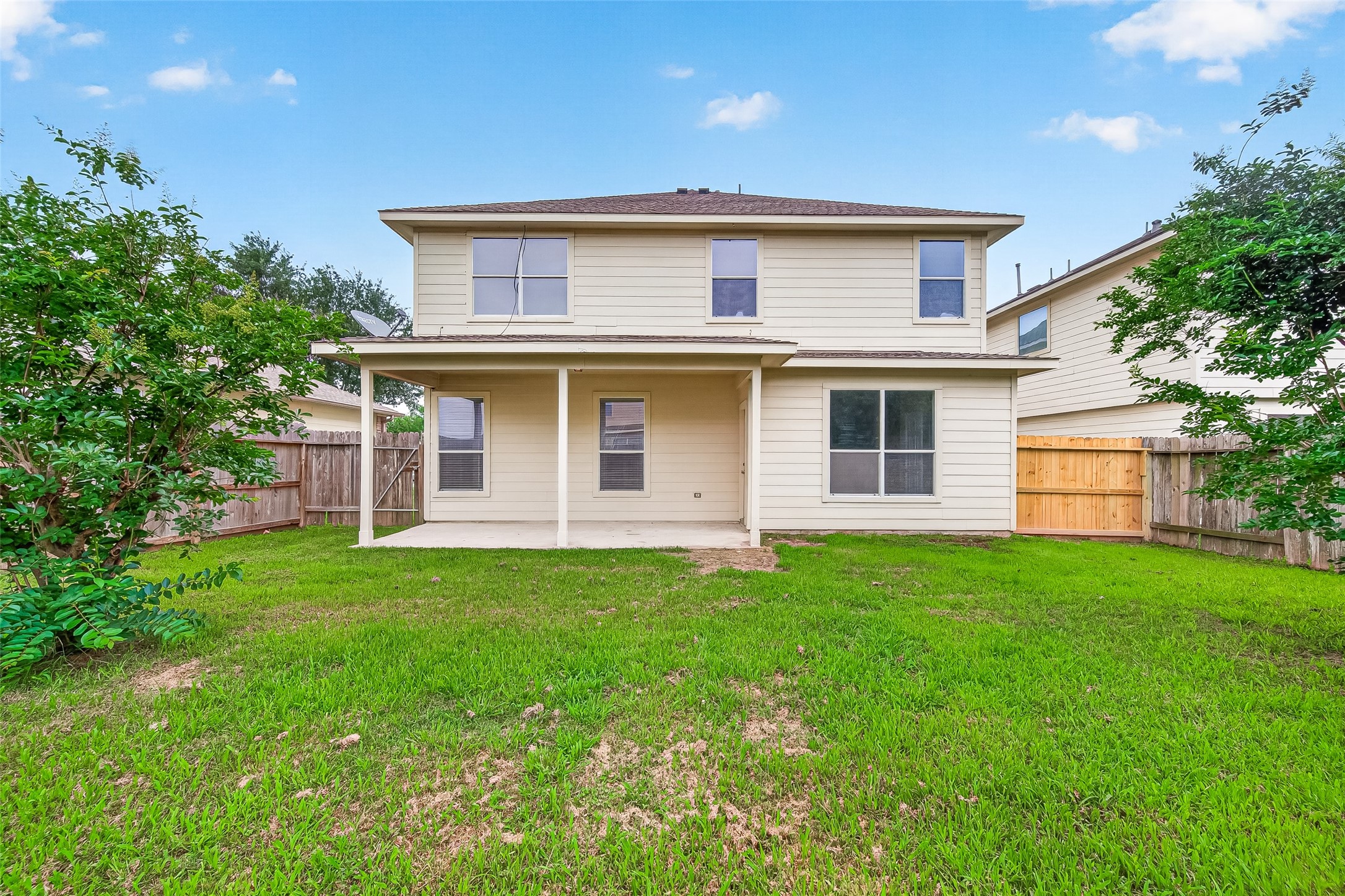 21327 Bella Flora Court Spring, TX 77379 - Photo 48 of 50 front view of a house with a yard