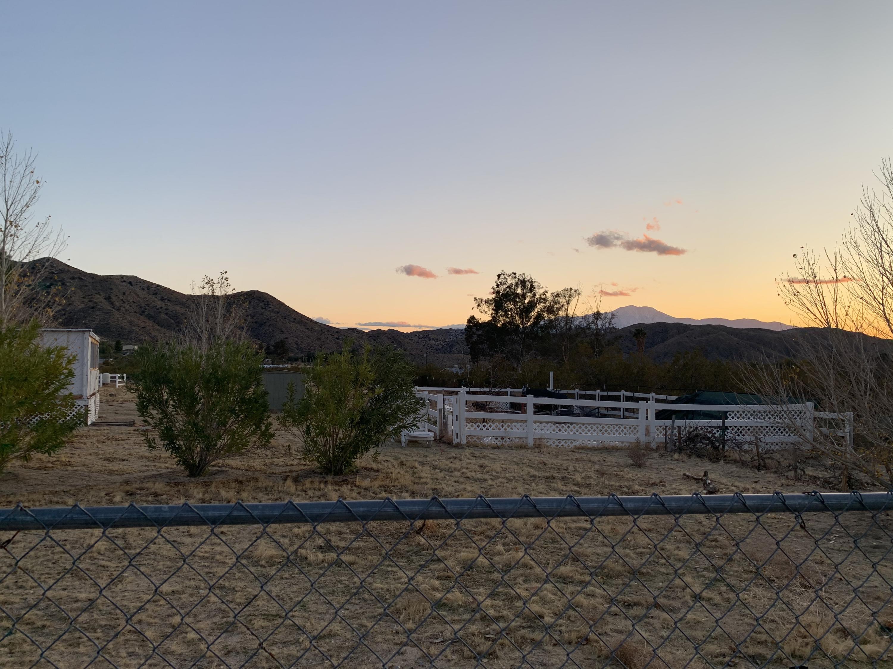 52781 Northridge Road Morongo Valley, CA 92256 - Photo 2 of 22 a view of a dry yard with trees