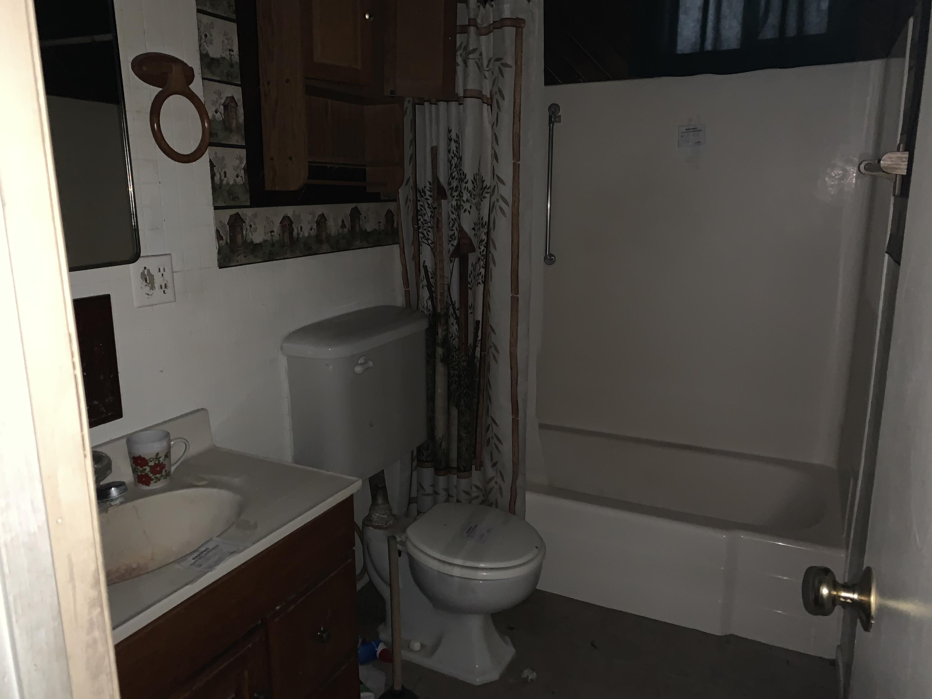 52781 Northridge Road Morongo Valley, CA 92256 - Photo 18 of 22 a bathroom with a sink toilet and shower