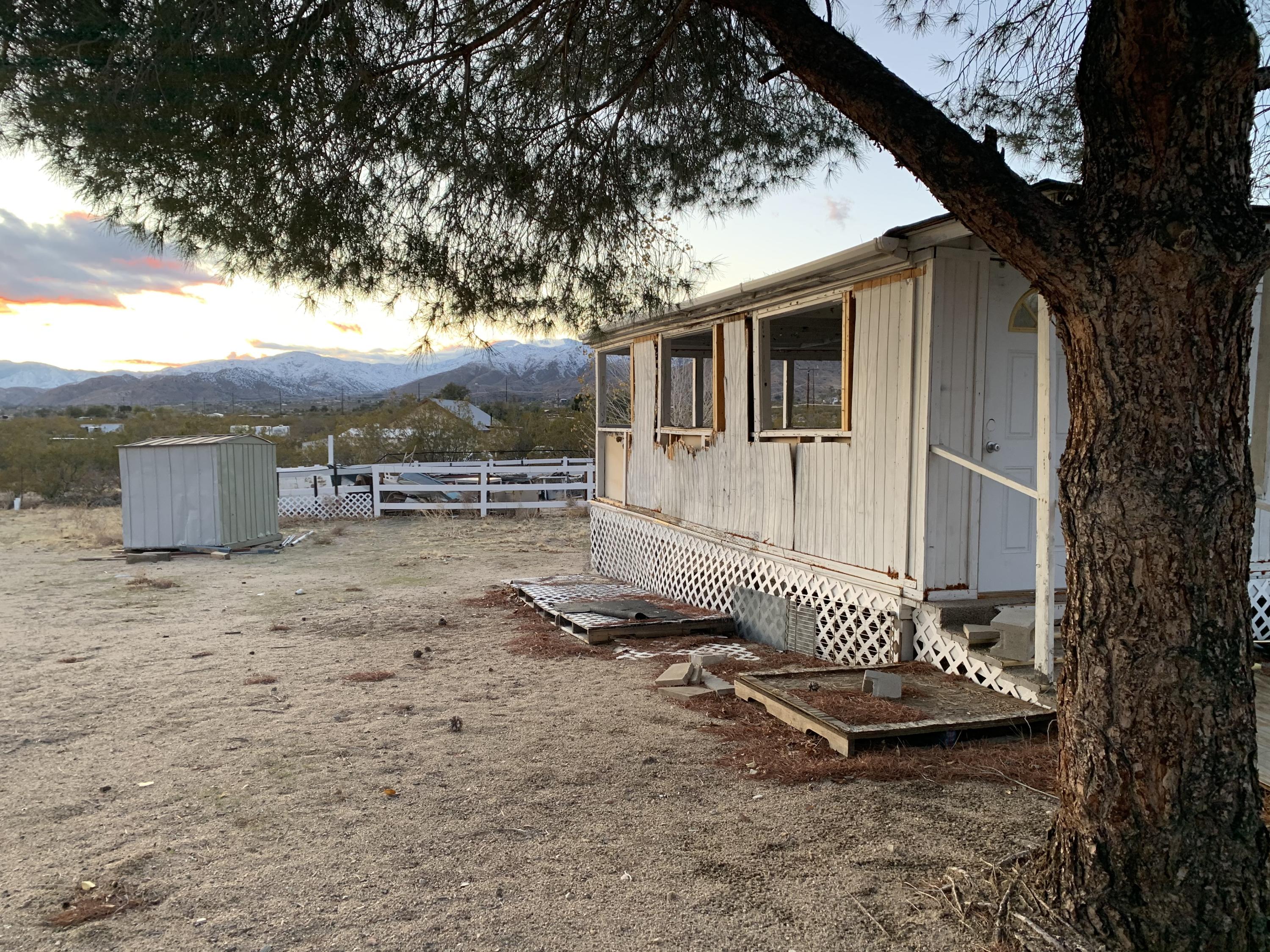 52781 Northridge Road Morongo Valley, CA 92256 - Photo 5 of 22 a view of backyard with barbeque grill and a large tree