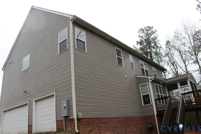 a view of a house with a street