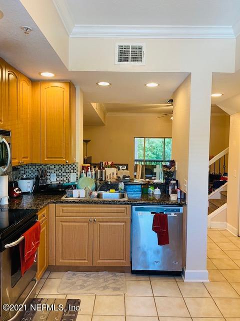 9745 Touchton Road, Unit 724 Jacksonville, FL 32246 - Photo 7 of 28 IMG_1586