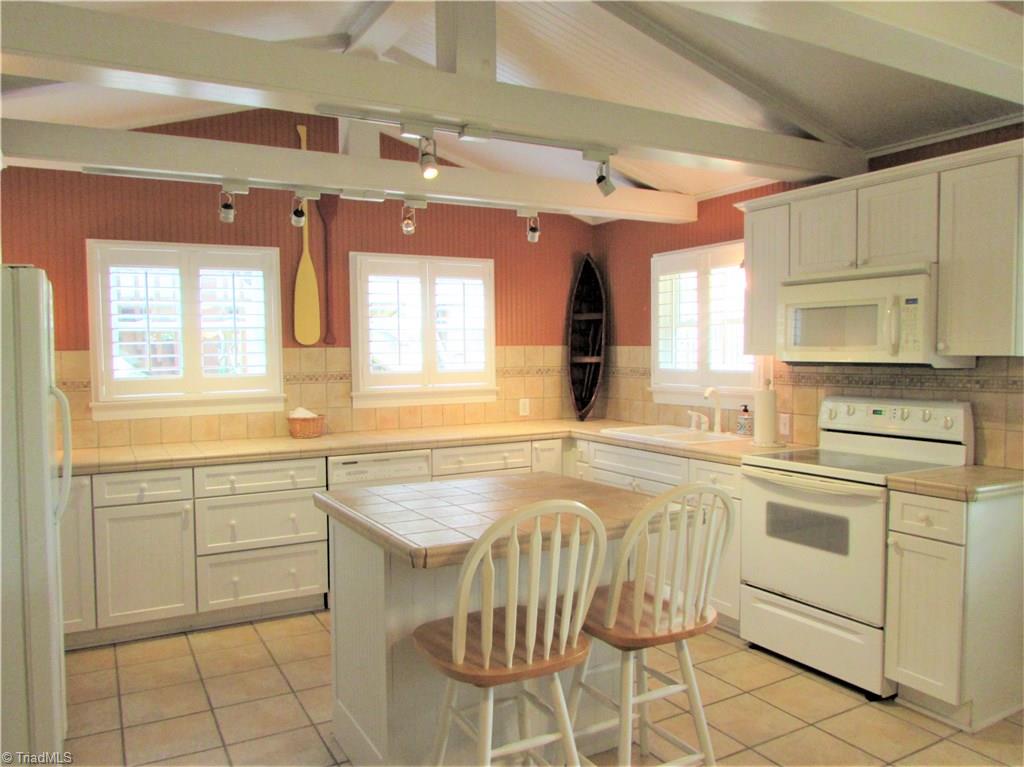 1532 Beckner Road Lexington, NC 27292 - Photo 25 of 30 Open concept kitchen with custom cedar pantry.