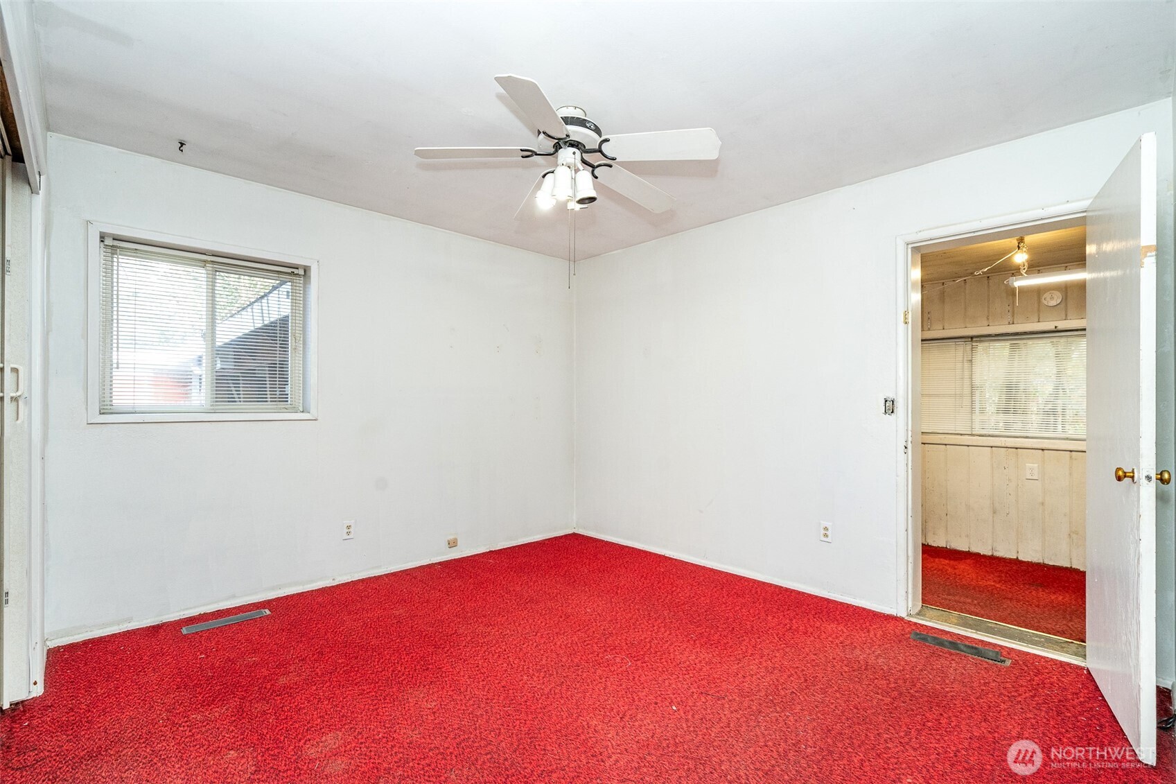 1428 Southwest Grandview Avenue Chehalis, WA 98532 - Photo 16 of 40 a view of empty room with window and ceiling fan