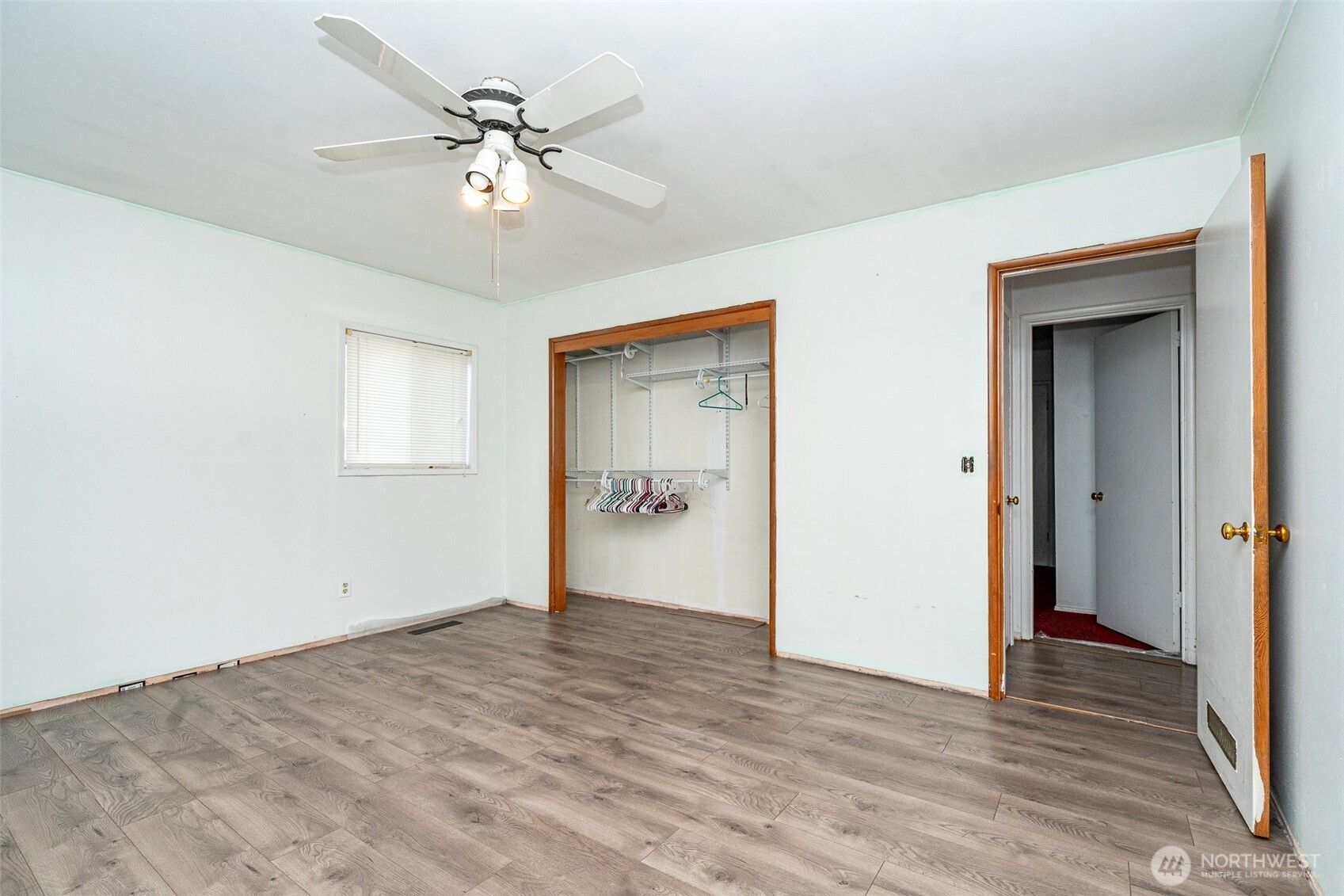 1428 Southwest Grandview Avenue Chehalis, WA 98532 - Photo 22 of 40 a view of an empty room with wooden floor