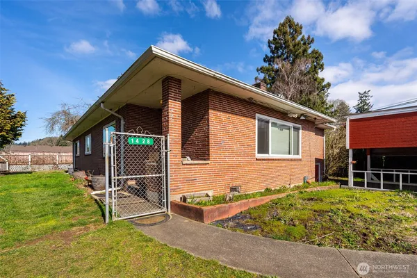 front view of house with a yard