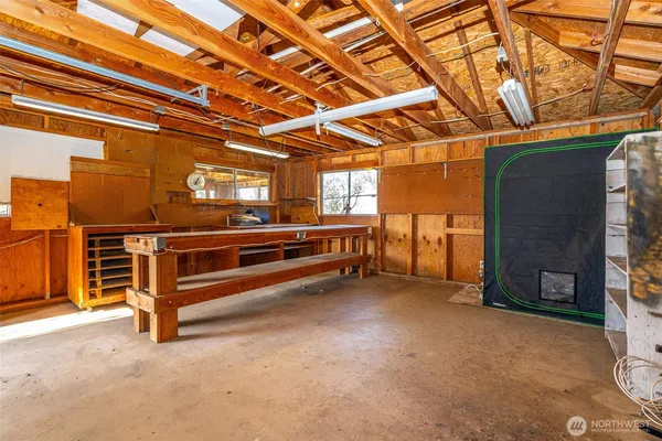 a view of an empty room with a fireplace