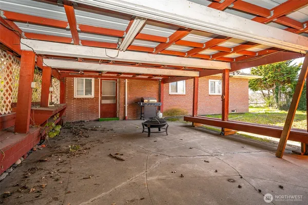 a view of sitting area in front of house