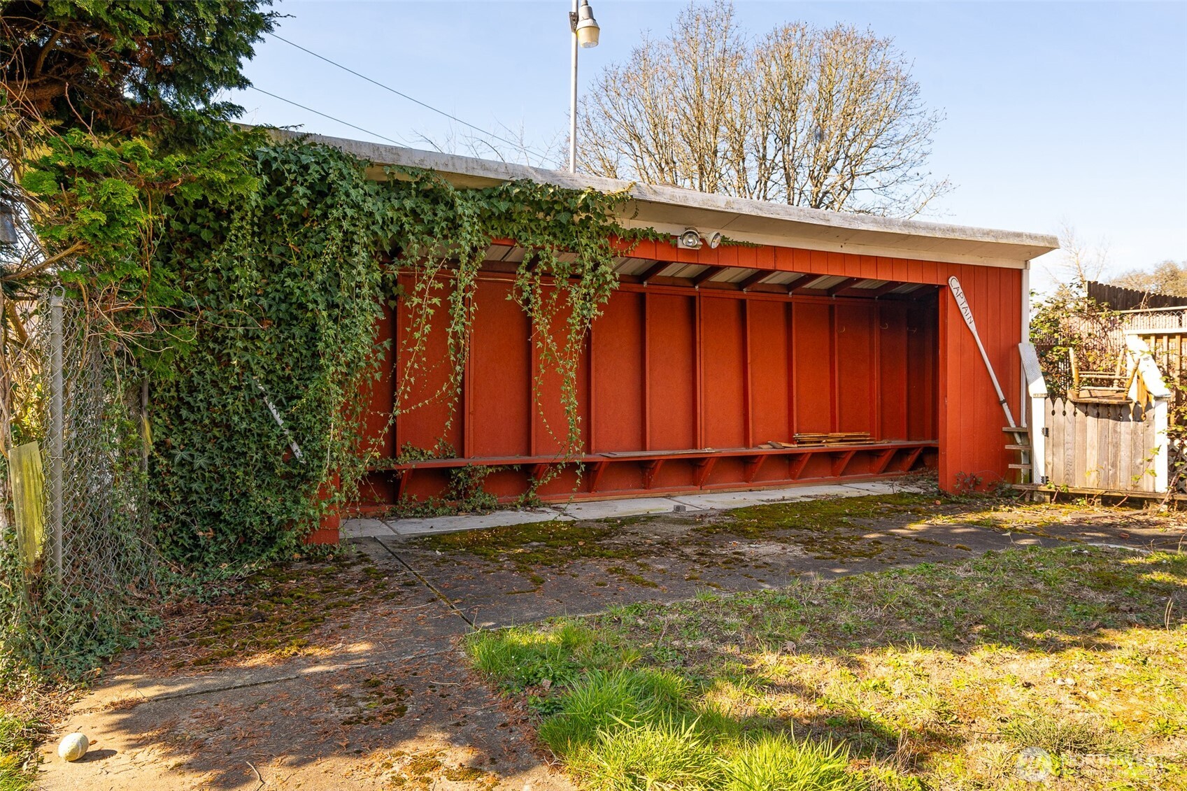 1428 Southwest Grandview Avenue Chehalis, WA 98532 - Photo 37 of 40 a view of a backyard with trees