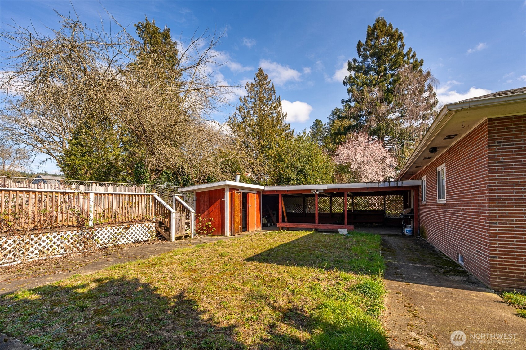 1428 Southwest Grandview Avenue Chehalis, WA 98532 - Photo 38 of 40 a view of a house with a yard