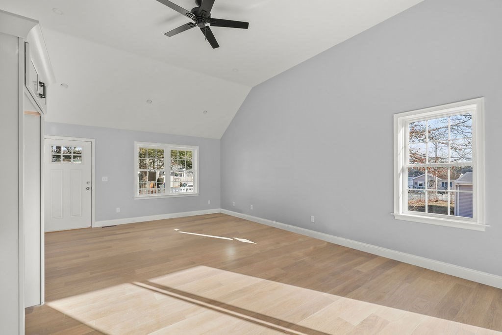 81 Maple Springs Road Wareham, MA 02571 - Photo 5 of 17 a view of a big room with windows and closet