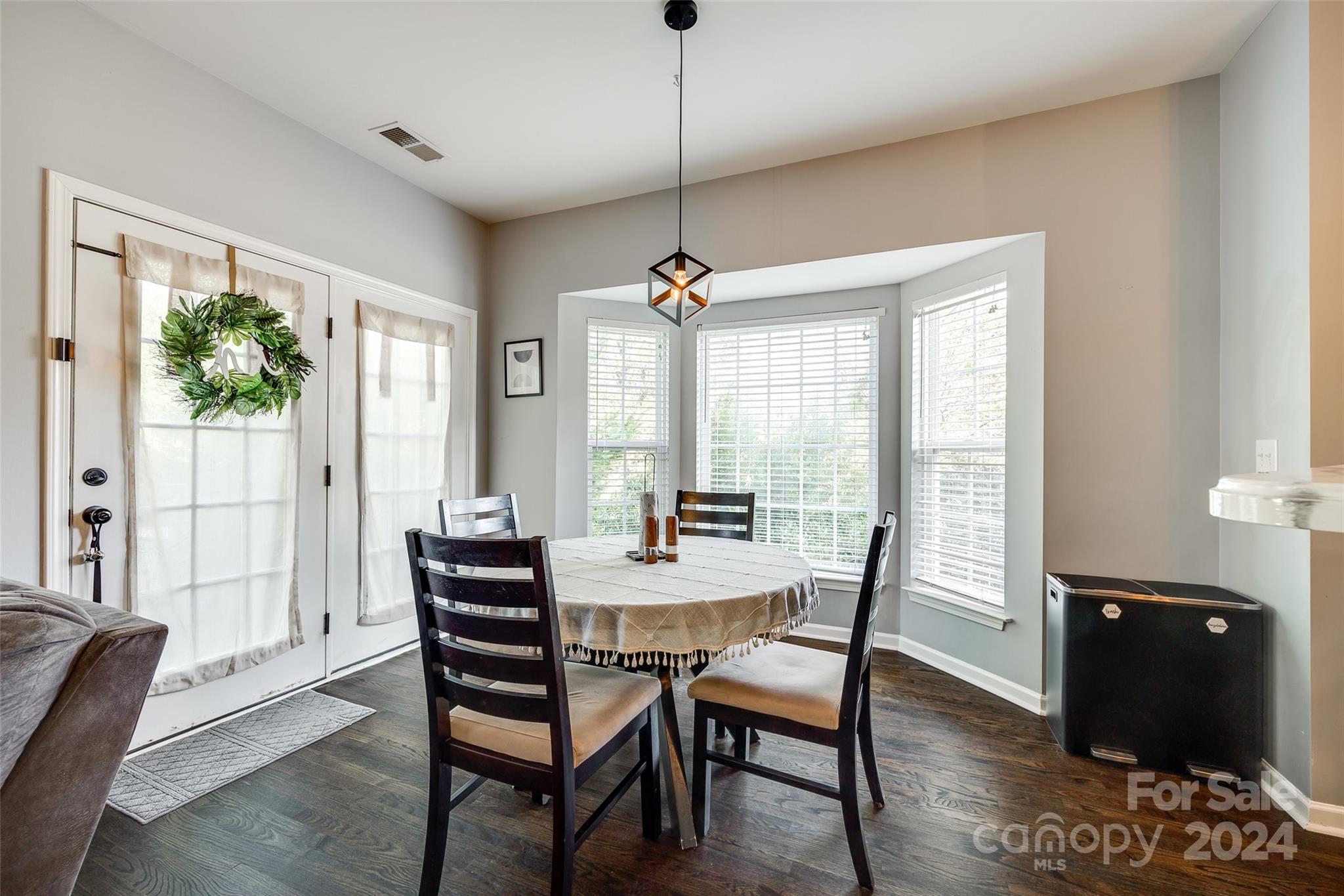 11417 Winget Pond Road Charlotte, NC 28278 - Photo 12 of 39 a dining room with furniture and window