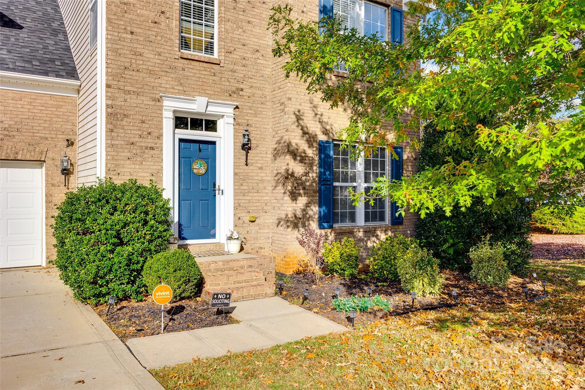 11417 Winget Pond Road Charlotte, NC 28278 - Photo 2 of 39 a view of a building with potted plants
