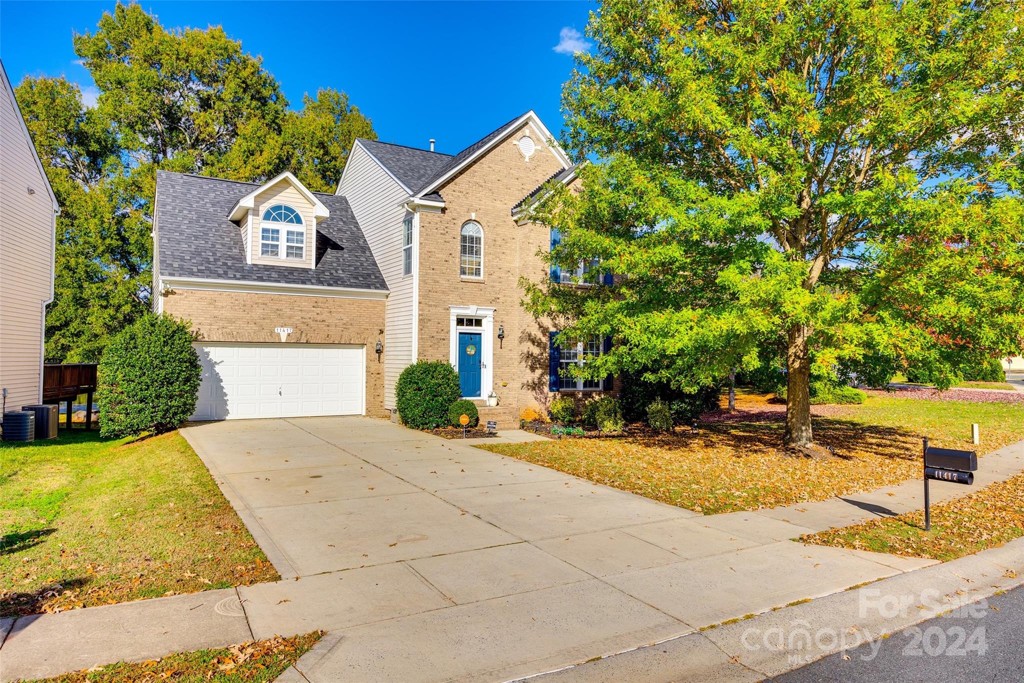 11417 Winget Pond Road Charlotte, NC 28278 - Photo 38 of 39 a front view of a house with a yard