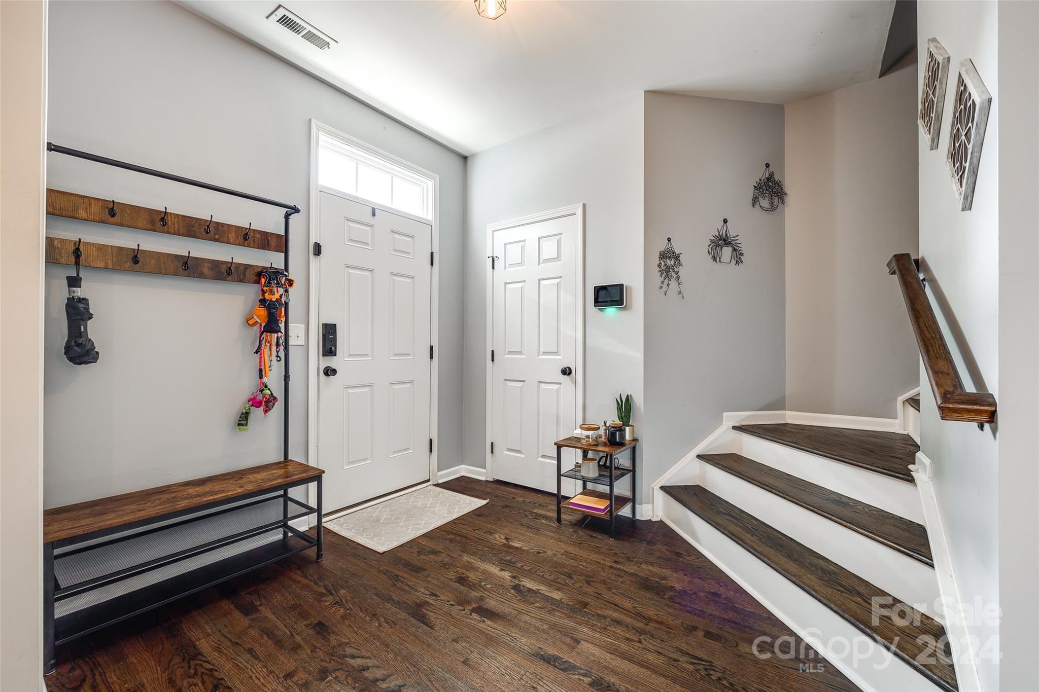 11417 Winget Pond Road Charlotte, NC 28278 - Photo 4 of 39 a view of room with stairs and wooden floor