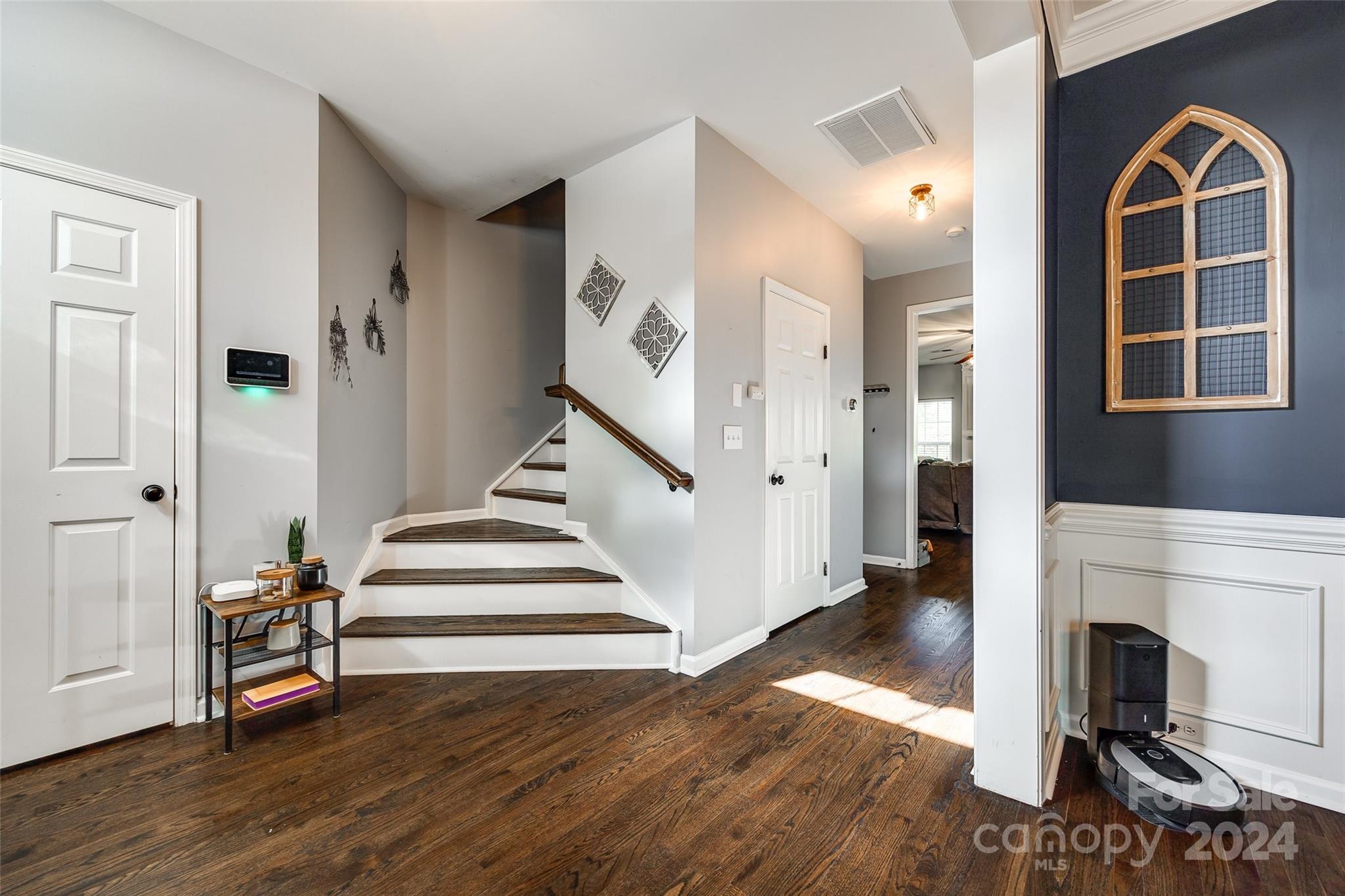 11417 Winget Pond Road Charlotte, NC 28278 - Photo 5 of 39 a view of entryway and hall with wooden floor