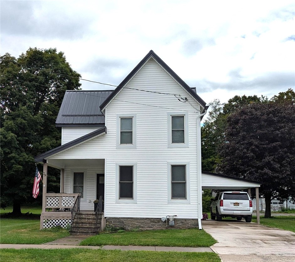 79 Liberty Street Walton, NY 13856 - Photo 1 of 1 Proud lady with brand new roof