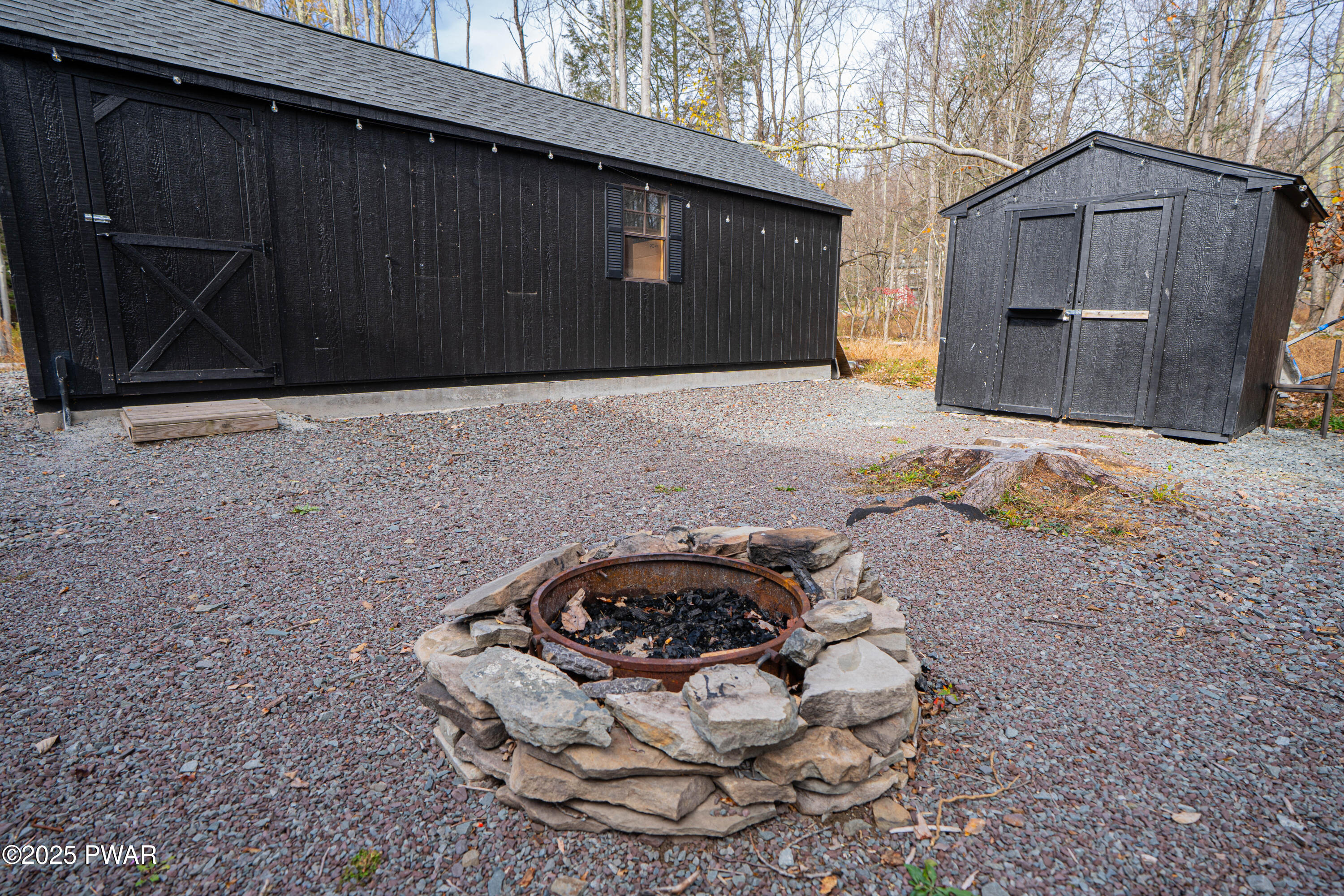 1267 Brookfield Road Lake Ariel, PA 18436 - Photo 5 of 41 a backyard of a house with a yard and garage