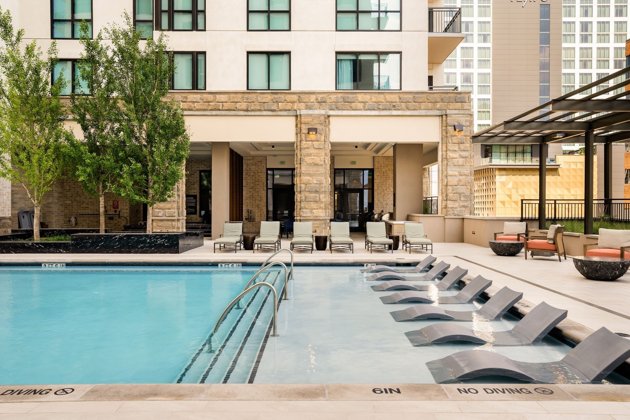 930 Commerce Street, Unit 28 Nashville, TN 37203 - Photo 13 of 31 a view of a house with swimming pool and sitting area
