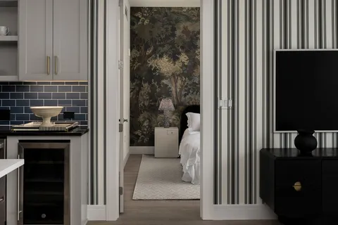 a kitchen with a refrigerator and a stove