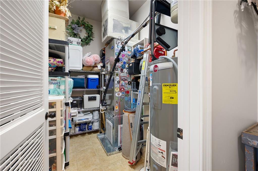 360 Chambers Street, Unit 407 Woodstock, GA 30188 - Photo 33 of 62 a view of storage and utility room