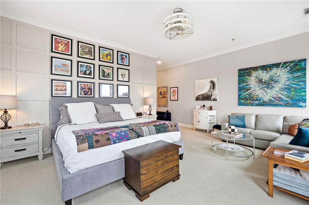 360 Chambers Street, Unit 407 Woodstock, GA 30188 - Photo 41 of 62 a living room with furniture and painting on the wall