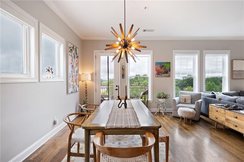 360 Chambers Street, Unit 407 Woodstock, GA 30188 - Photo 10 of 62 a living room with furniture and a large window