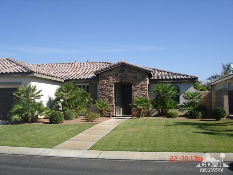 83436 Lightning Road Indio, CA 92203 - Photo 2 of 23 front view of a house with a yard