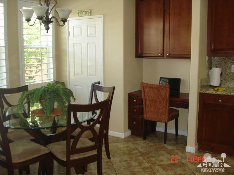 83436 Lightning Road Indio, CA 92203 - Photo 11 of 23 a view of a dining room with furniture and a window