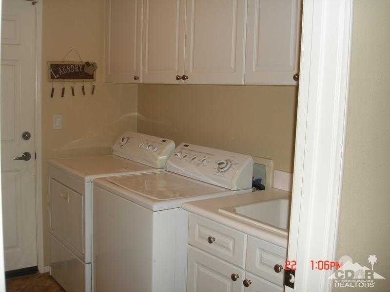 83436 Lightning Road Indio, CA 92203 - Photo 18 of 23 a utility room with dryer and washer