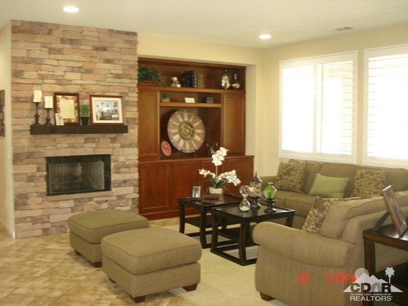 83436 Lightning Road Indio, CA 92203 - Photo 3 of 23 a living room with furniture and a fireplace