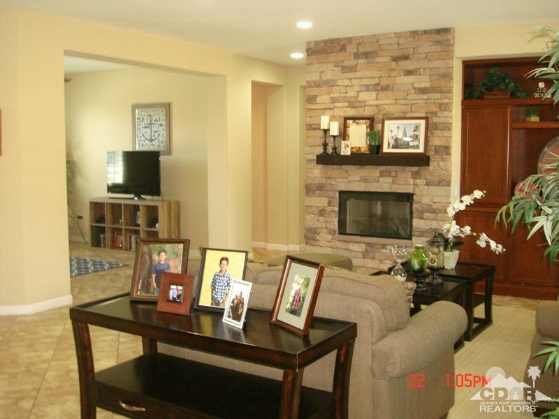 83436 Lightning Road Indio, CA 92203 - Photo 5 of 23 a living room with furniture and a fireplace