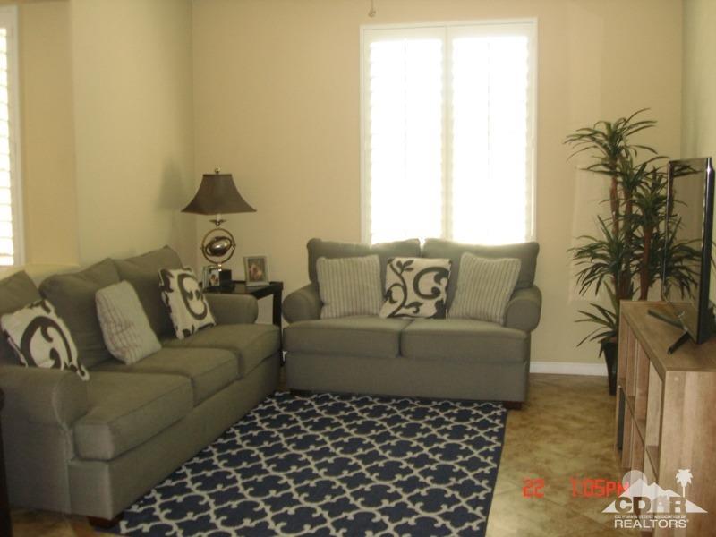 83436 Lightning Road Indio, CA 92203 - Photo 6 of 23 a living room with furniture and a potted plant