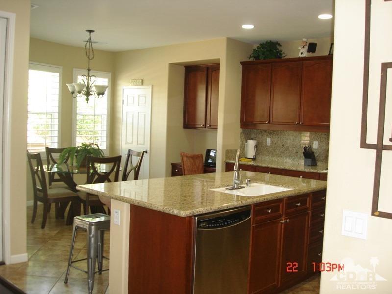 83436 Lightning Road Indio, CA 92203 - Photo 10 of 23 a kitchen with a sink and a refrigerator