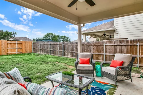 a outdoor living space with furniture and garden view