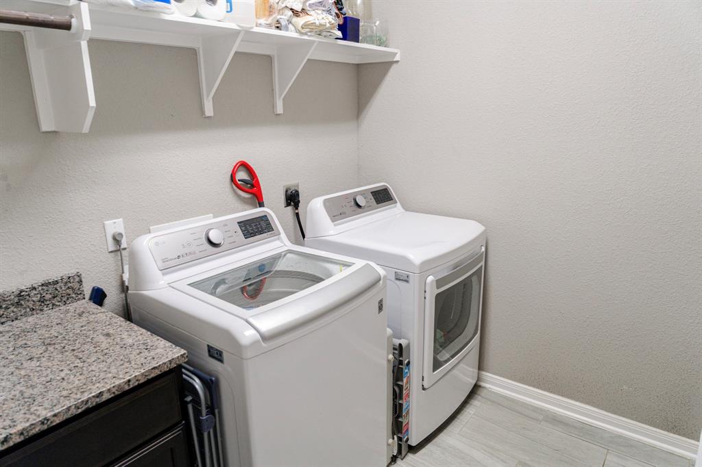 2716 Beutel Road Lorena, TX 76655 - Photo 37 of 39 a utility room with dryer and washer