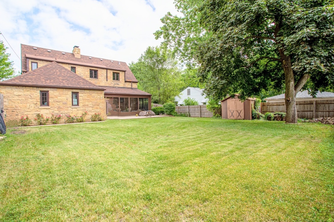 1010 Black Road Joliet, IL 60435 - Photo 14 of 17 a house view with swimming pool in front of it