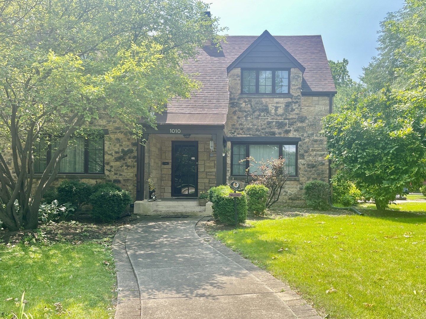 1010 Black Road Joliet, IL 60435 - Photo 2 of 17 a front view of a house with garden